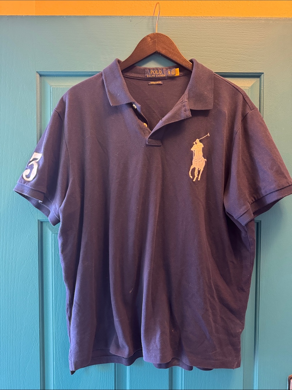 Ralph Lauren Navy Blue Polo Shirt with White Pony Logo.